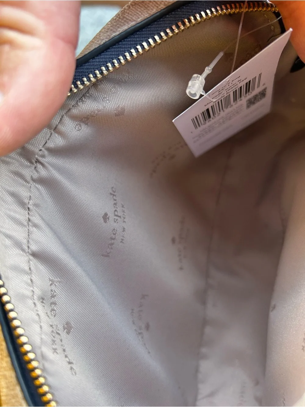 kate spade beige logo-lined handbag interior
